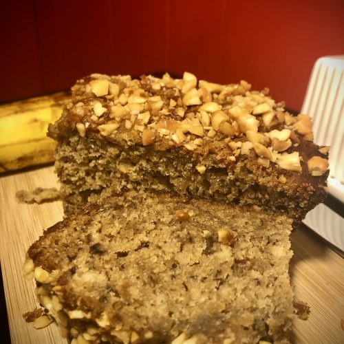 PB&J banana bread topped with peanuts