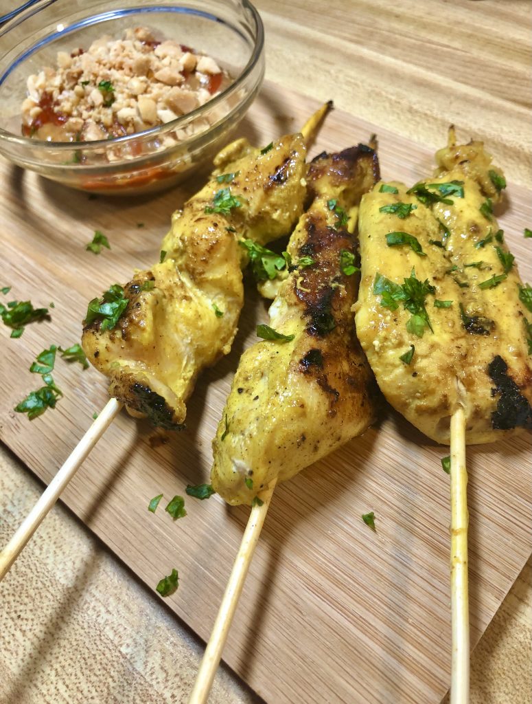 chicken satay skewers with peanut sauce on side