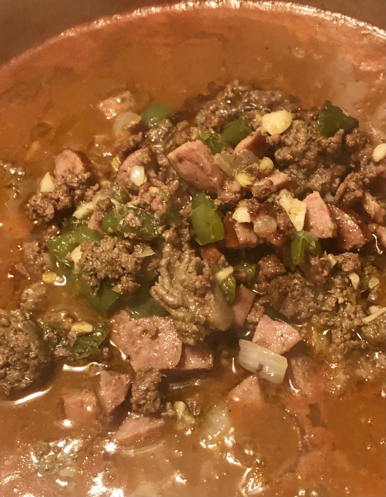 hamburger, kielbasa and veg added to pot of chili