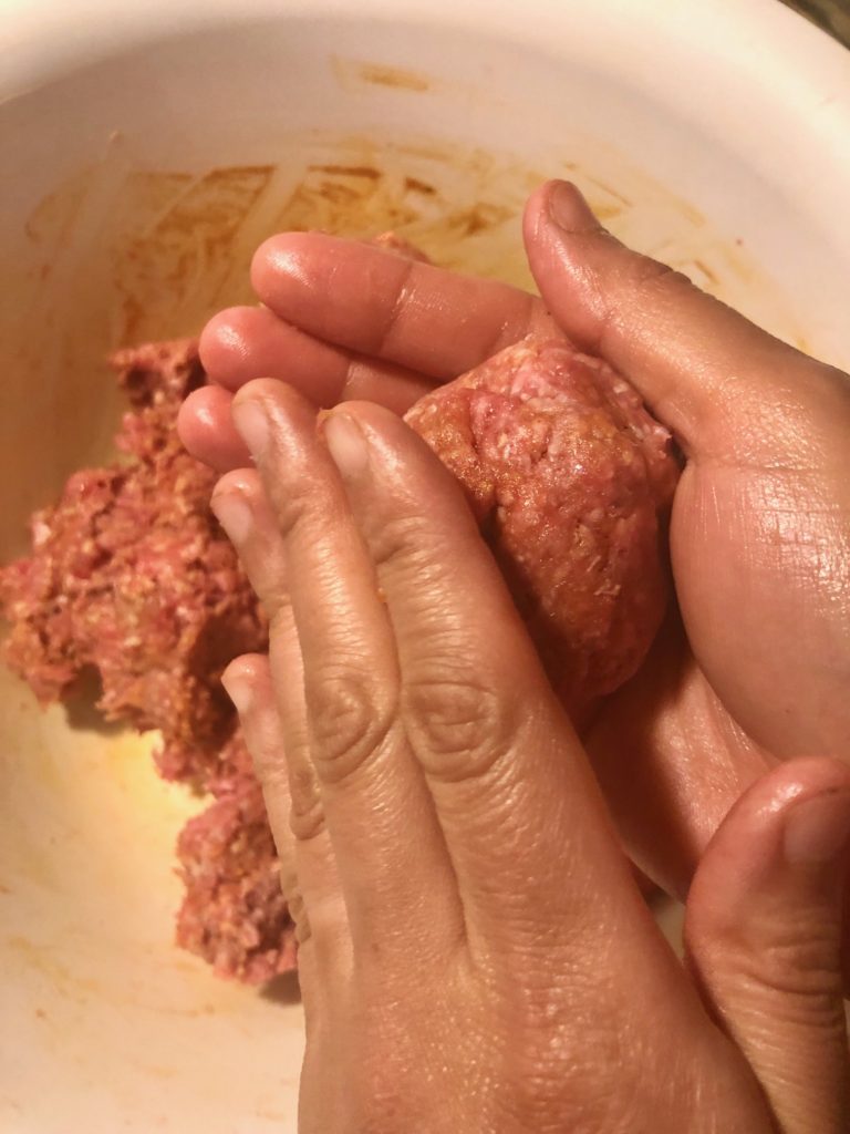 rolling meatballs by hand