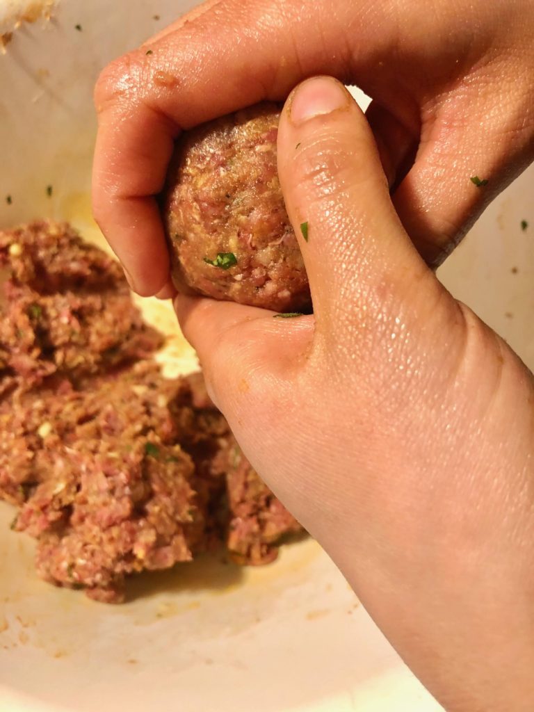 rolling meatballs