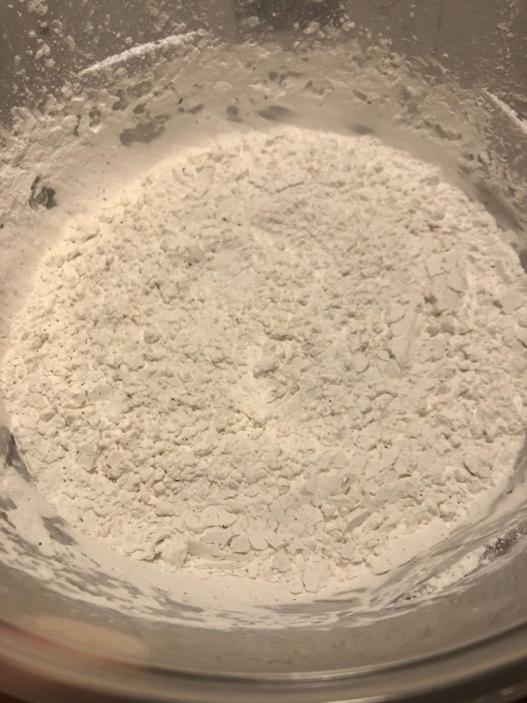 bowl of breading made with corn starch, salt and black pepper