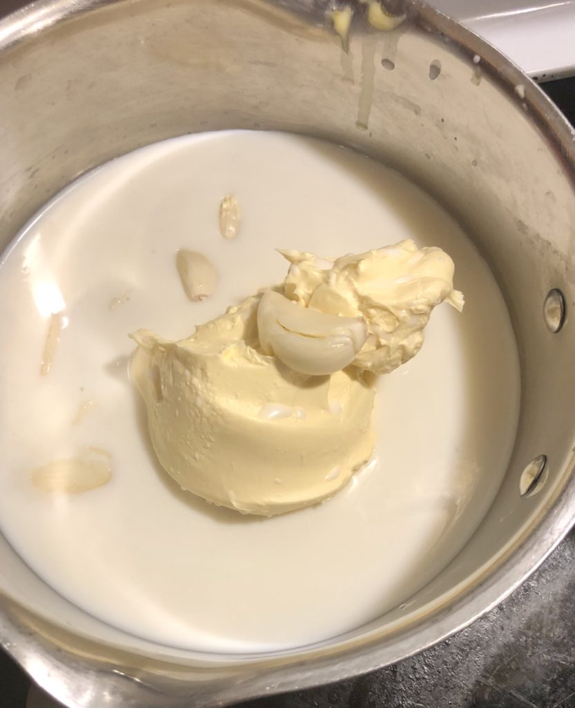 milk, butter and garlic in small saucepan