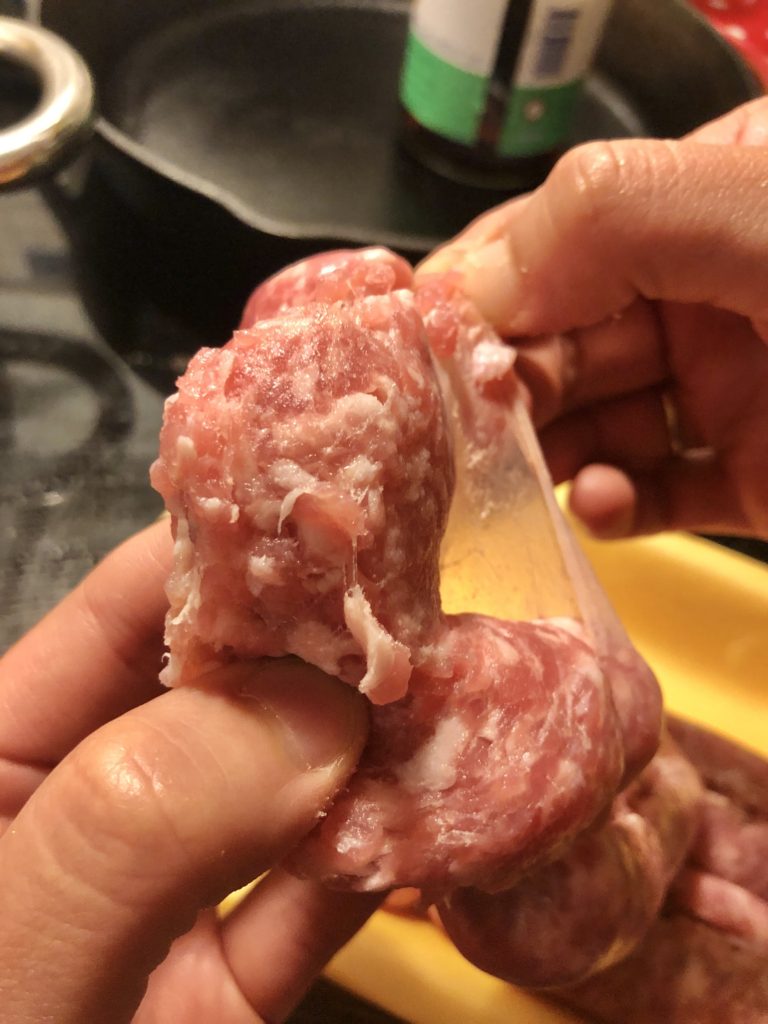 removing the casing for Italian sausage