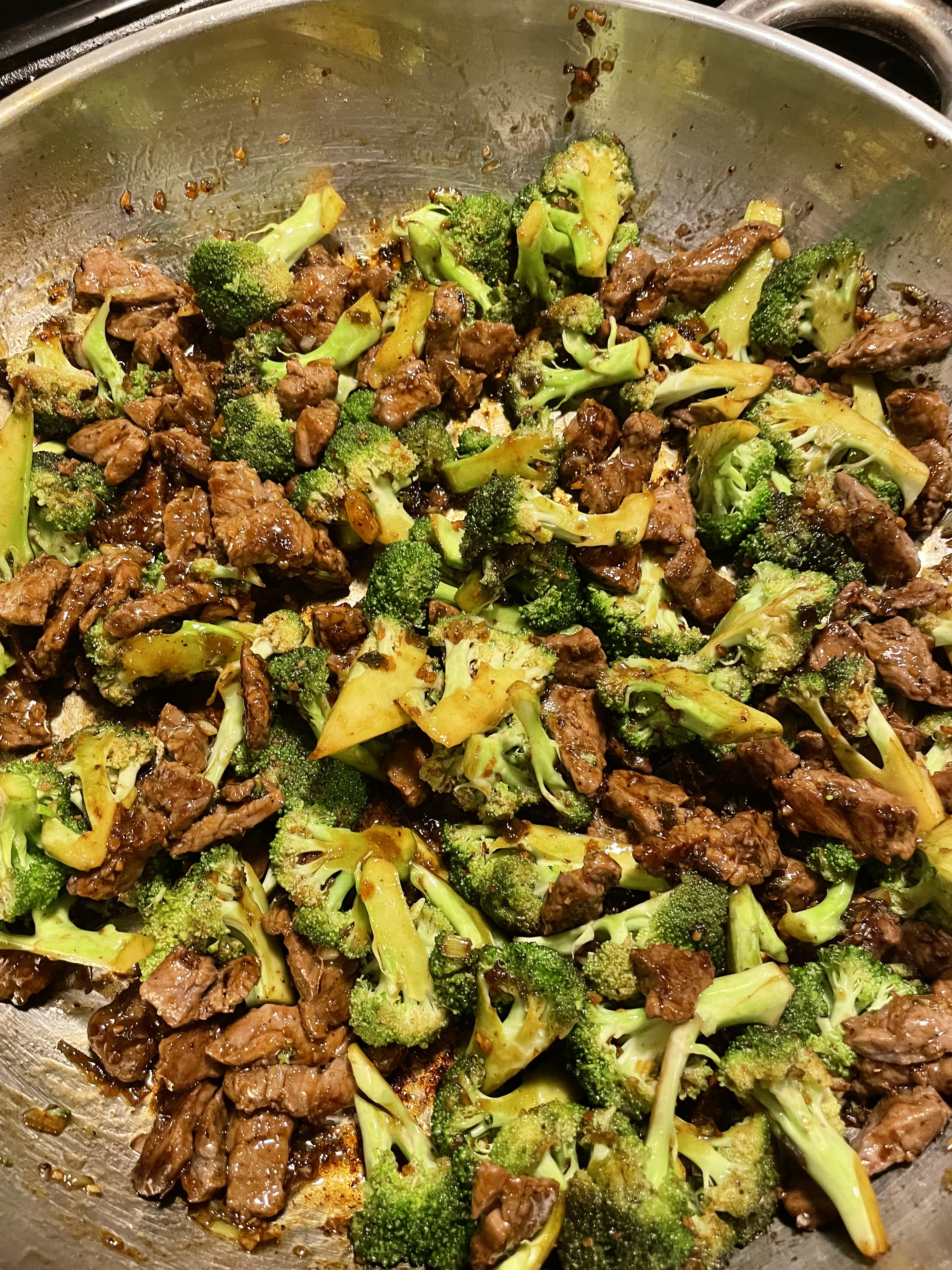 Chinese Beef and Broccoli prepared in a large frying pan.
