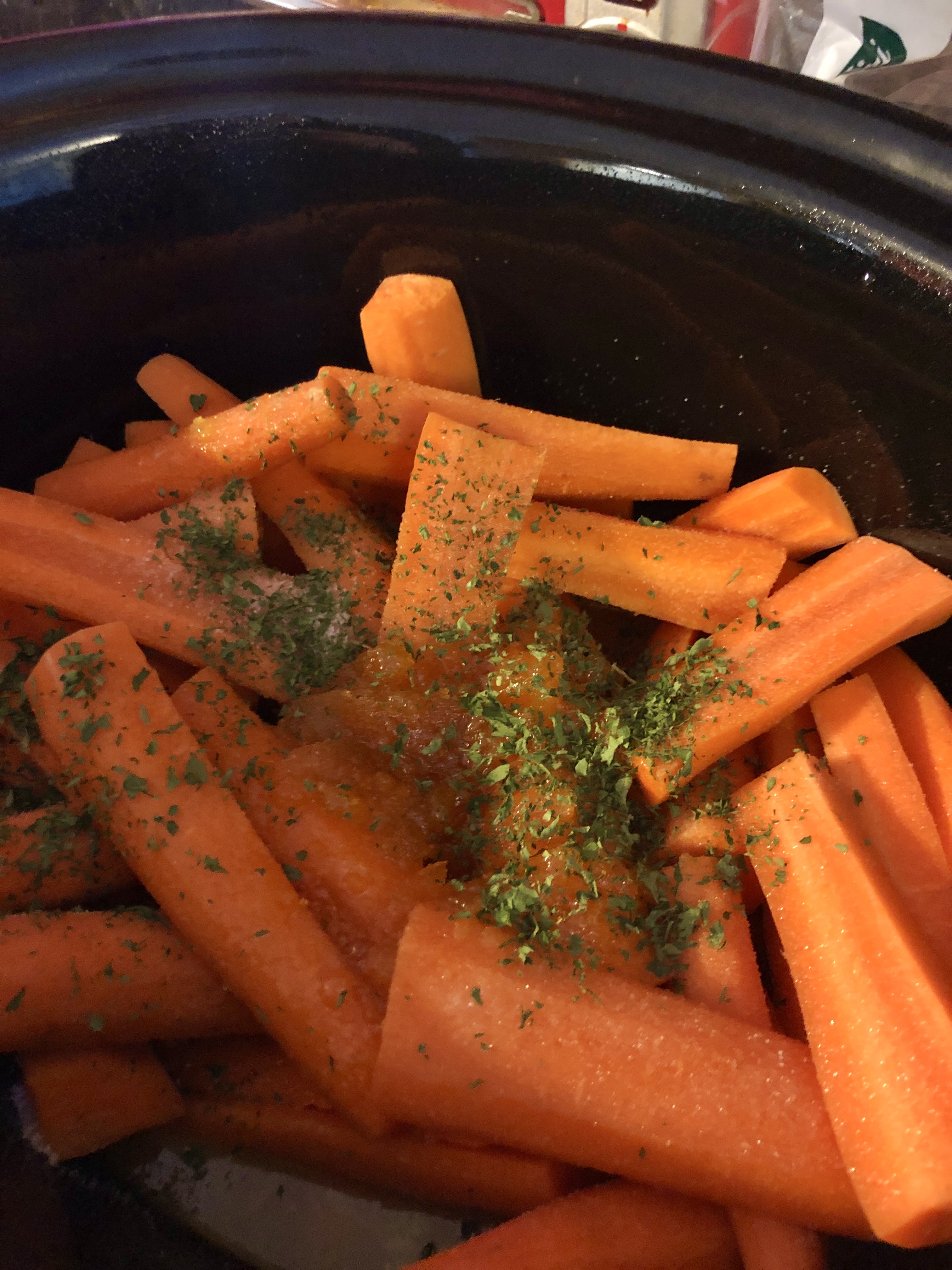Season carrots with salt and dried parsley.